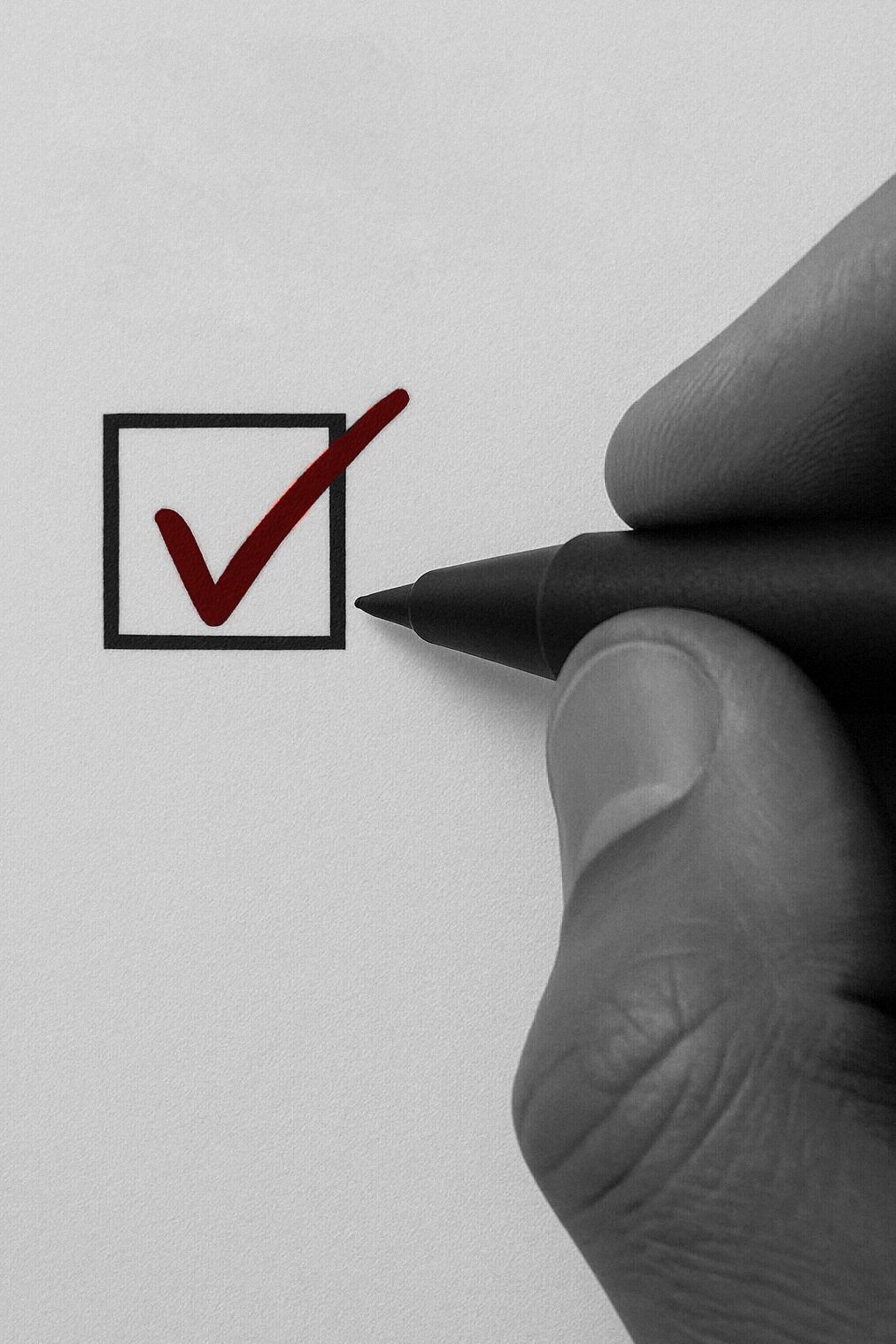 A red check mark being drawn in a square.